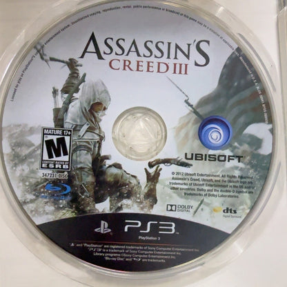 Fotografía real del disco de Assassin's Creed III para PlayStation 3 usado