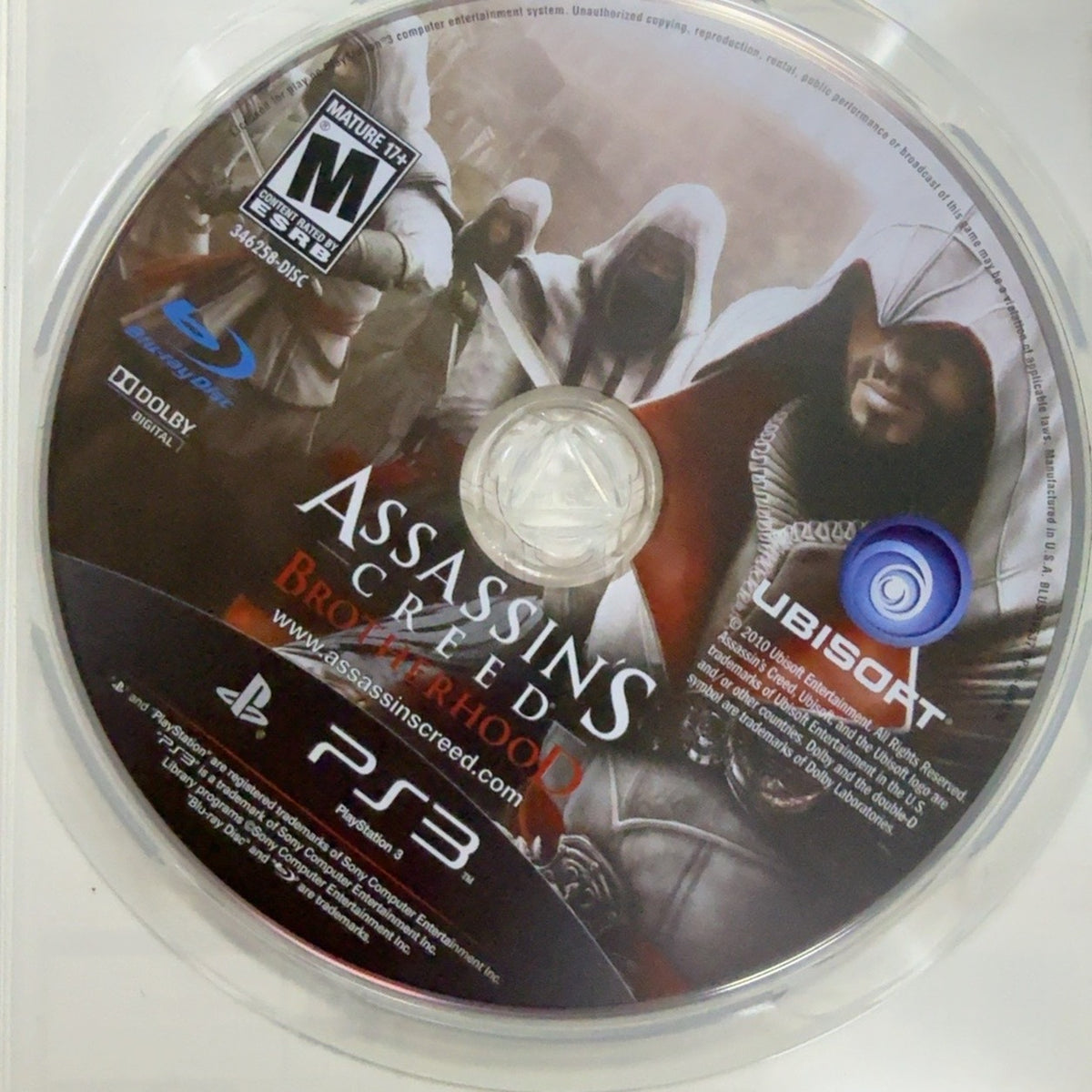 Fotografía real del disco de Assassin's Creed Brotherhood para PlayStation 3 usado