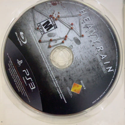 Fotografía real del disco de Heavy Rain Director's Cut para PlayStation 3 usado