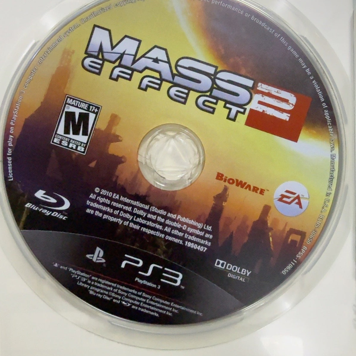 Fotografía real del disco de Mass Effect 2 para PlayStation 3 usado